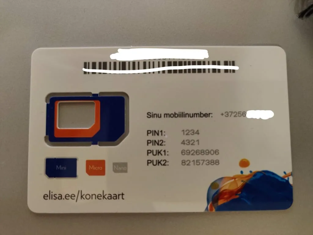 The back of an Elisa SIM card with important details