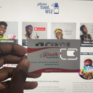 Gotalk SIM card held by Adu from Phone Travel Wiz