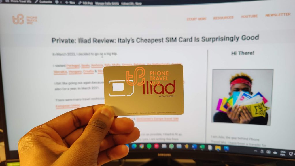 Iliad Italy SIM Card Held by Adu