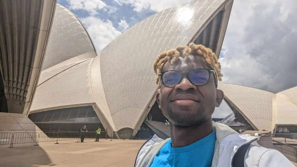Adu from Phone Travel Wiz in front of the Sydney Opera House New South Wales Australia