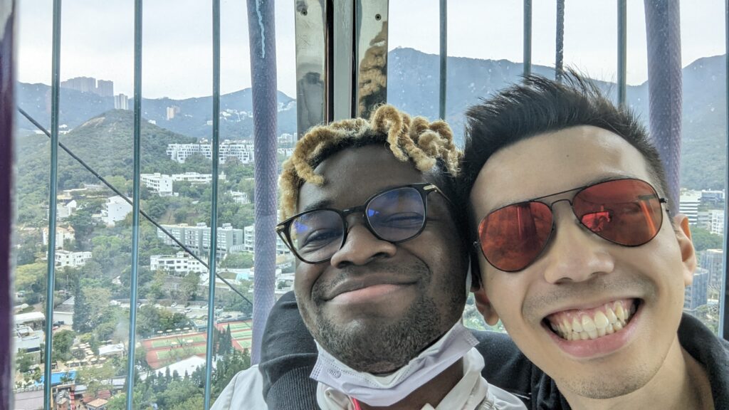 Adu and His Boyfriend in a Cable Car in Hong Kong