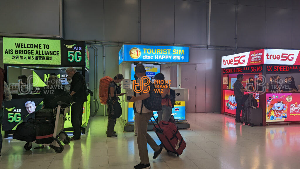 AIS, TrueMove H & Dtac Thailand & Thailand Booths in the Arrivals Hall at Bangkok-Suvarnabhumi Airport