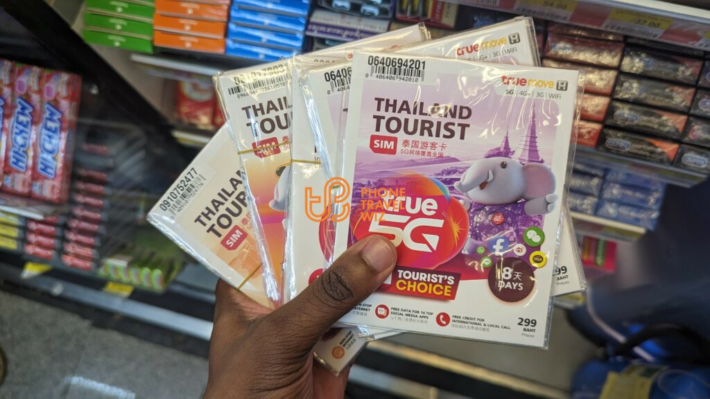 Adu from Phone Travel Wiz Hlding Various TrueMove H SIM Cards from the 7-Eleven at Don Mueang Airport