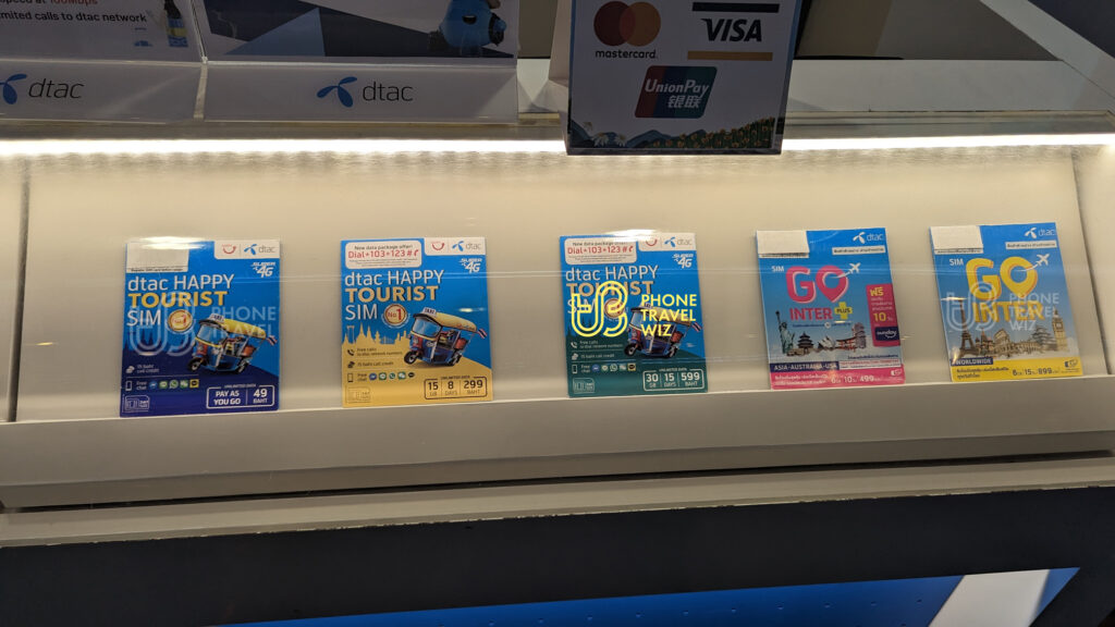 Dtac Thailand Happy Tourist SIM Cards on a Display at Phuket International Airport