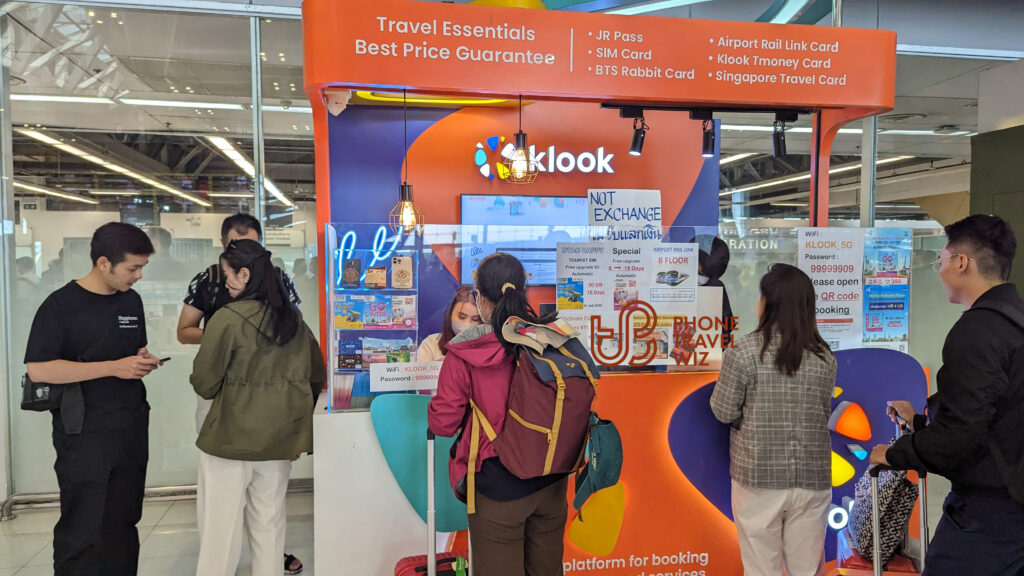 Klook Booth Selling Thai Tourist SIM Cards in the Departure Hall at Bangkok Suvarnabhumi Airport