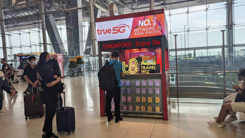 TrueMove H Thailand Booth Selling Travel SIM Cards in the Depature Hall at Bangkok Suvarnabhumi Airport