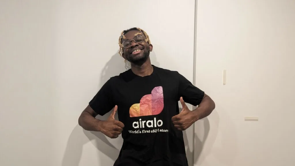 Adu from Phone Travel Wiz with an Airalo Shirt